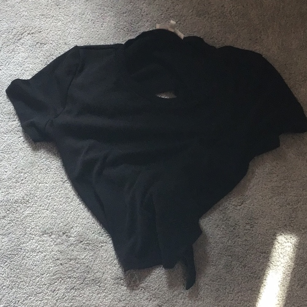 black short sleeve, open back. able to re tie